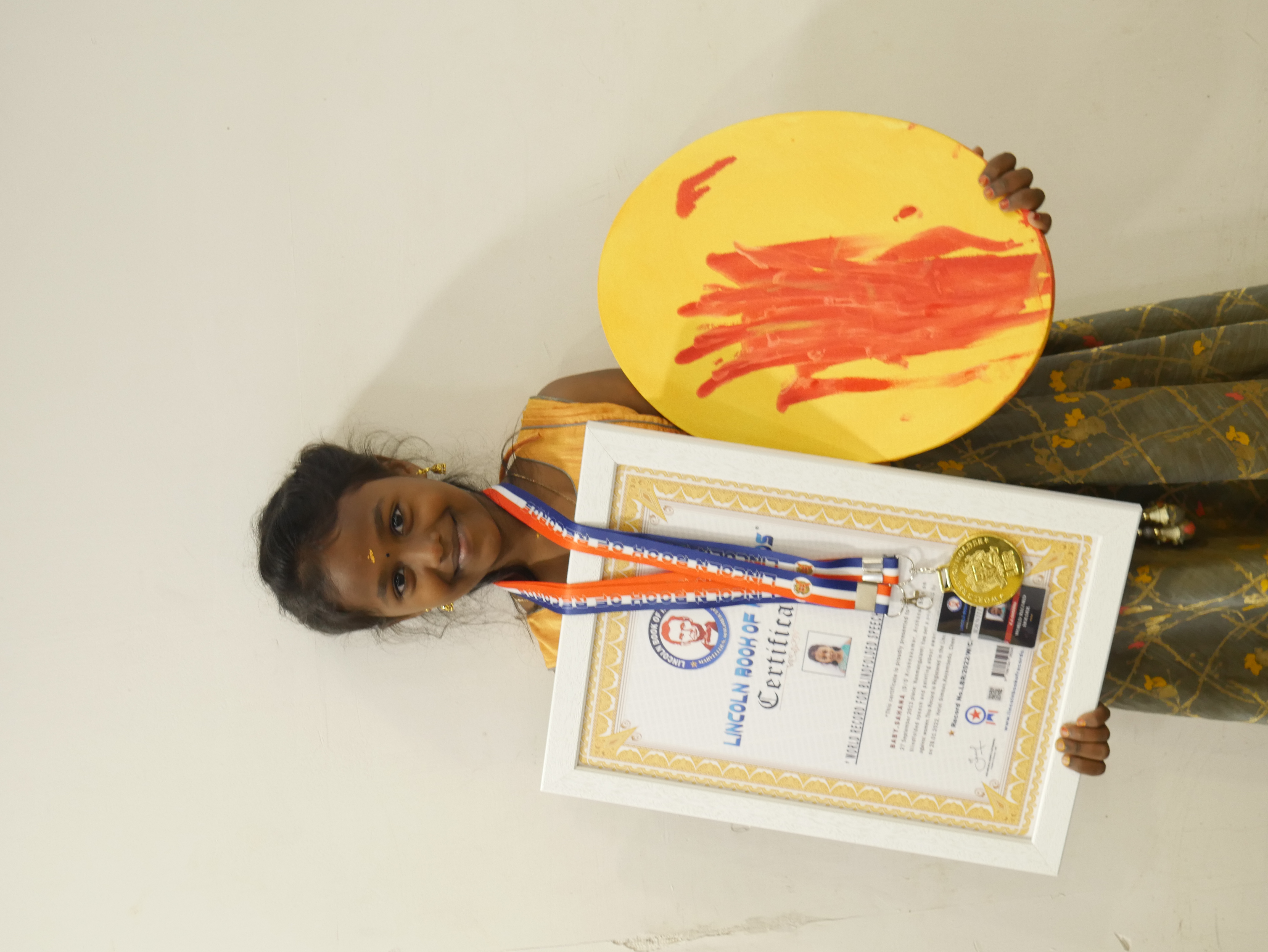 World record for blindfolded speech and painting