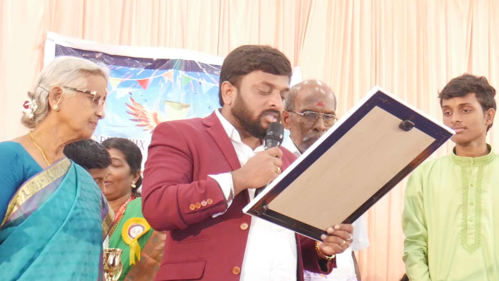"First child in the world to perform singing marathon  of carnatic songs for continuous 3 hours of time"