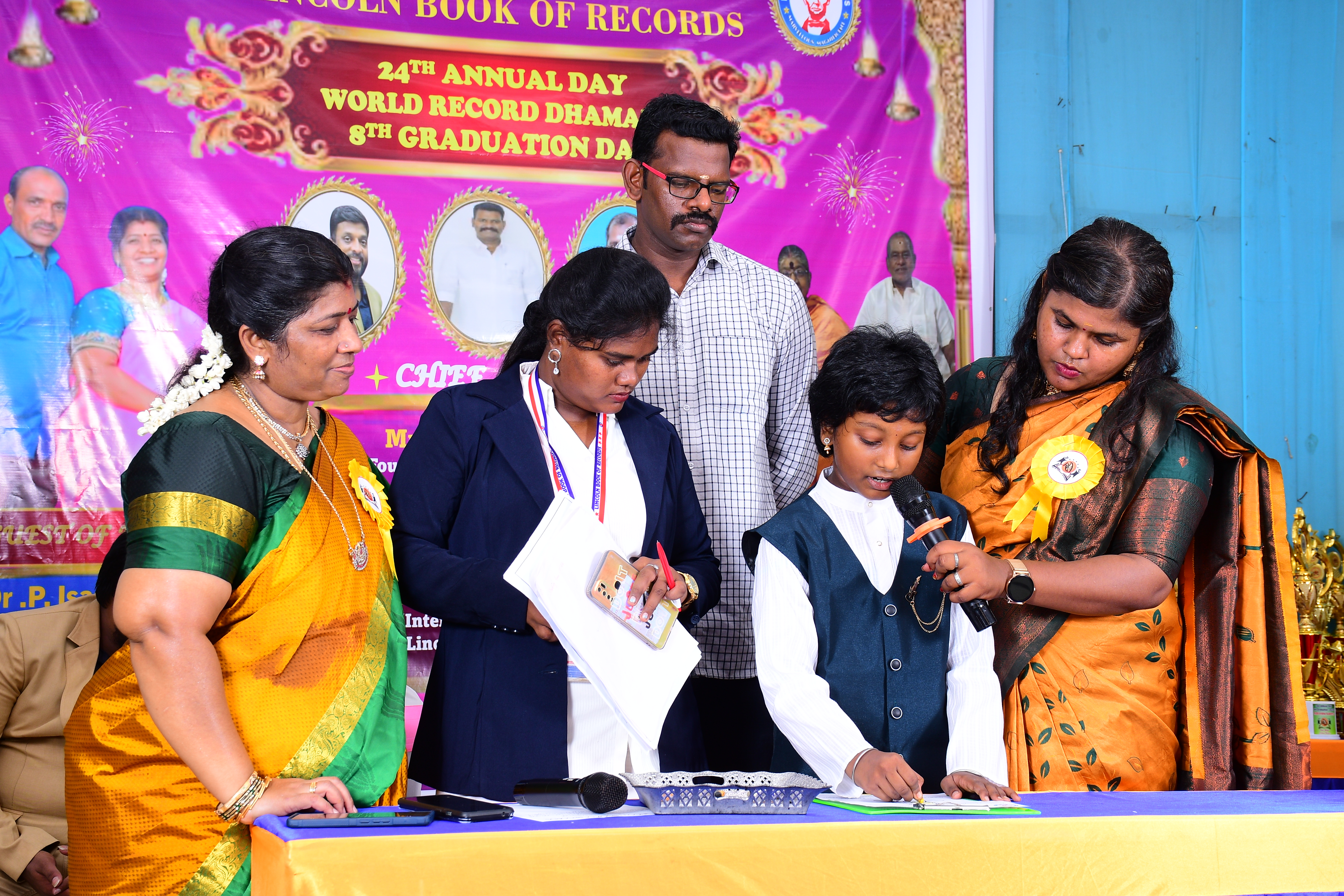 World record by reciting Squares of number 1-100 and simultaneously drawing and colouring the Image of the Indian Mathematician Srinivasa Ramanujan  in 5 minutes of time.